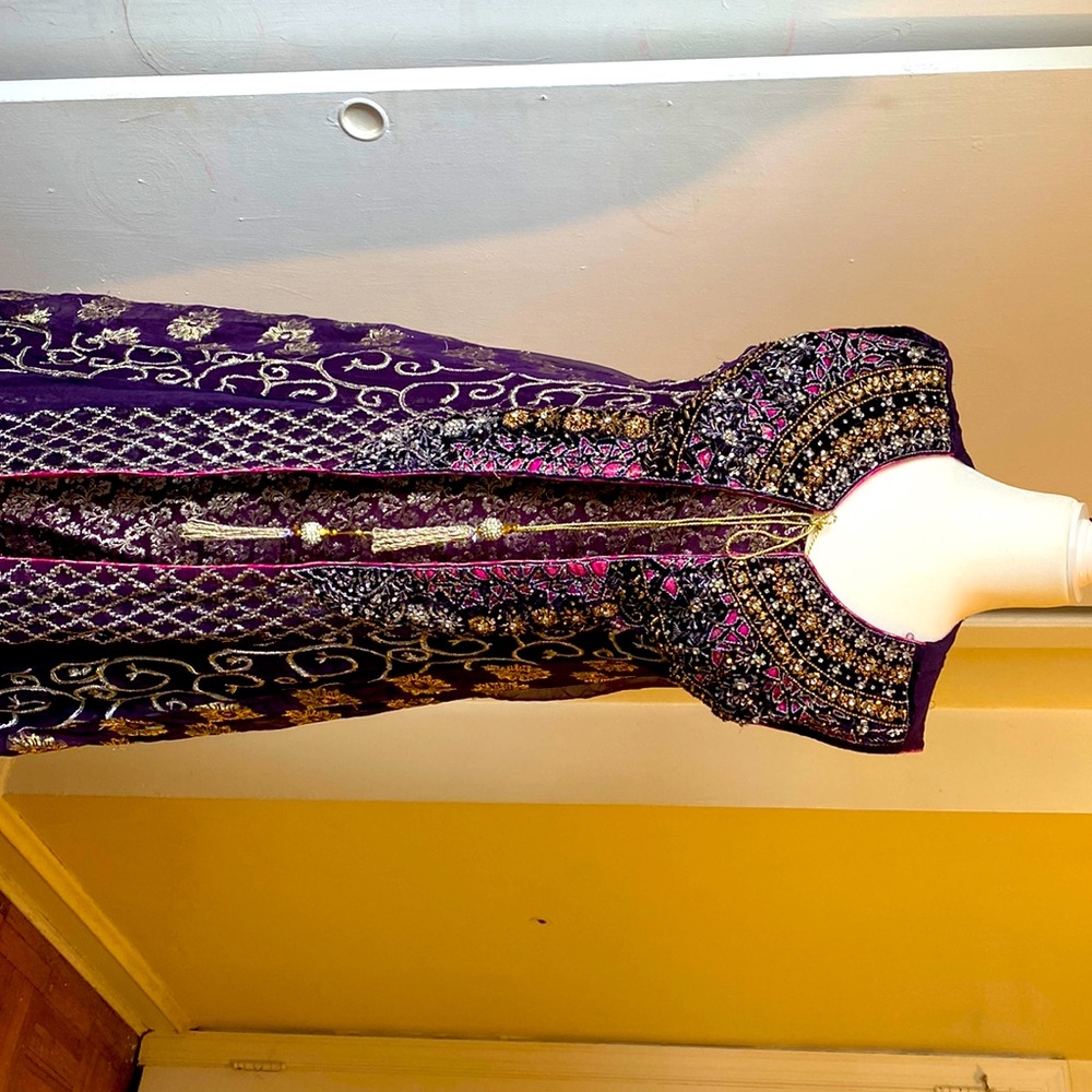Beautiful Purple Grown Pakistani traditional style with lovely work on it